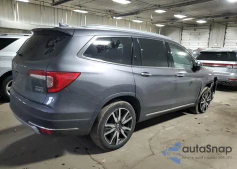 2021 Honda Pilot Touring z USA, uszkodzony, nr VIN 5FNYF6H96MB078913